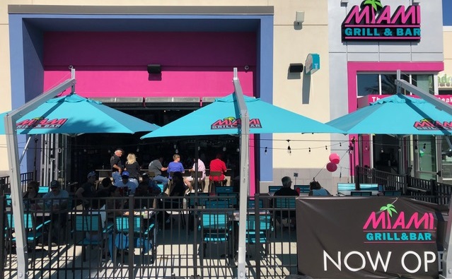 blue canonpy on a cantilever parasol with brand printing